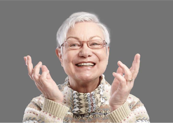happy old lady after dental implants treatment
