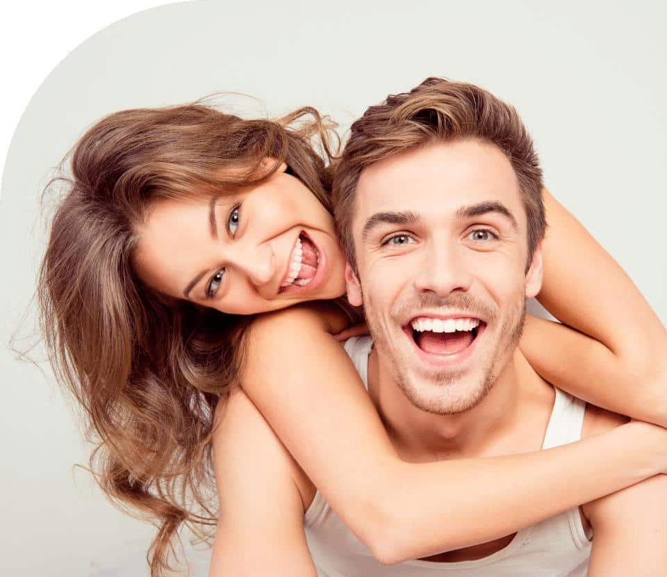 happy couples after teeth whitening treatment